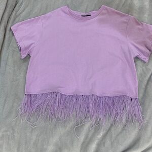 Purple blouse with feathers